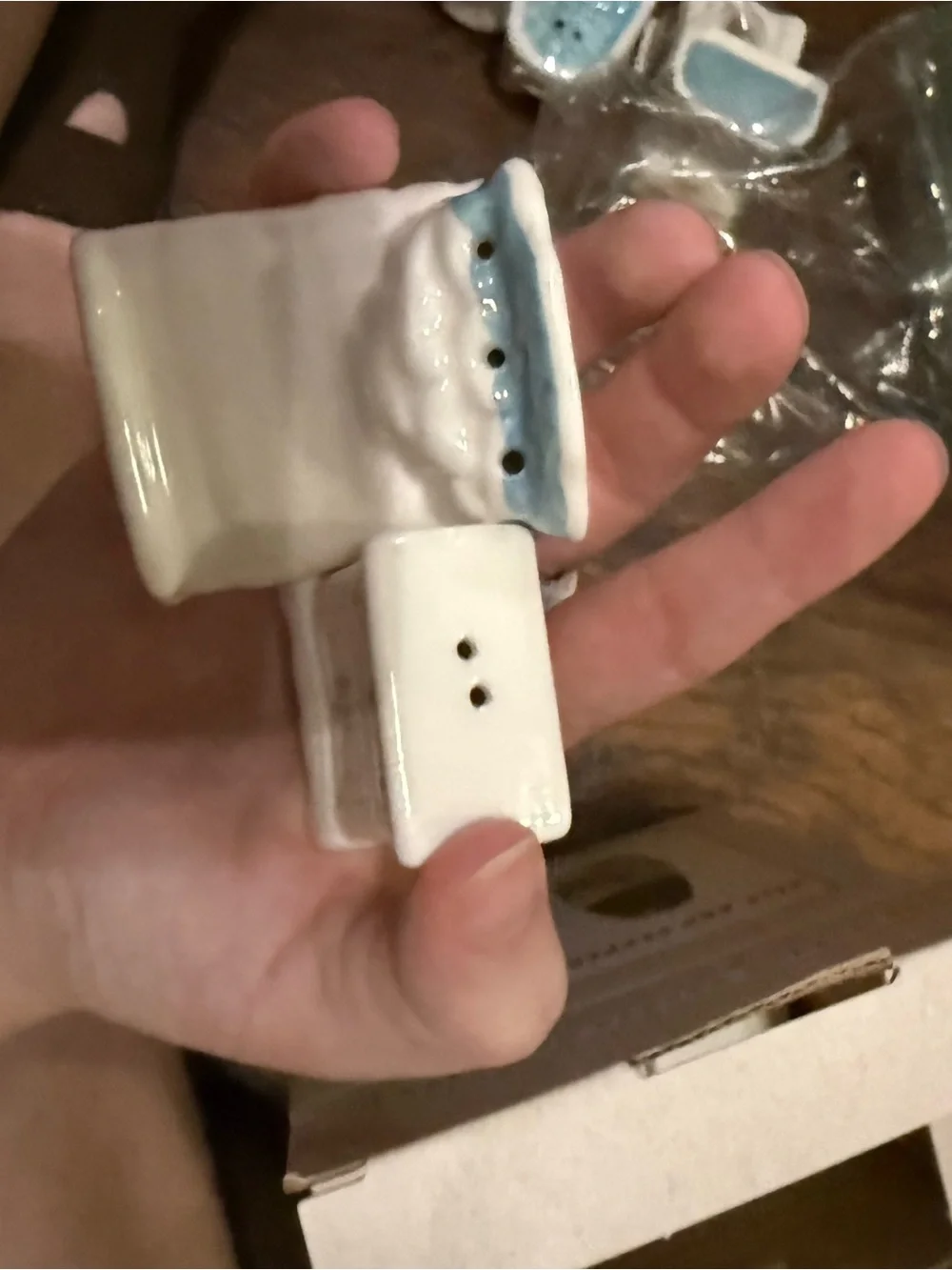 White Ceramic Salt and Pepper Shakers with Light Blue Trim